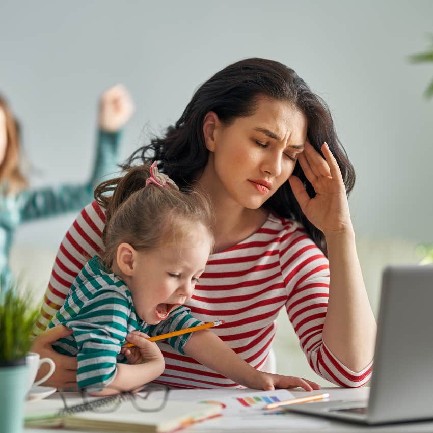 Stressed mom working from home with kids