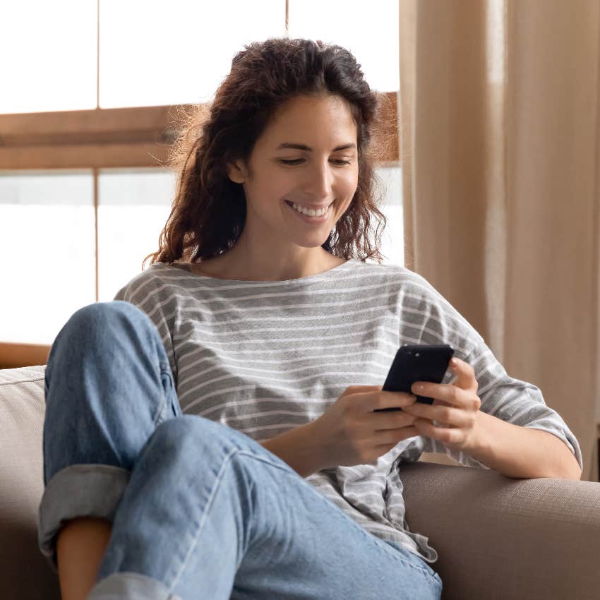 happy woman texting friends
