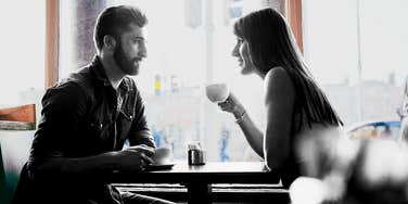 Man playing it cool while on a date, sending mixed signals of interest