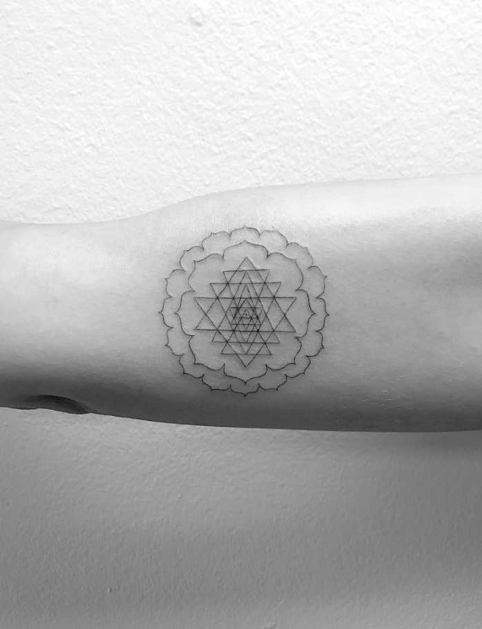 minimalist spiritual tattoo