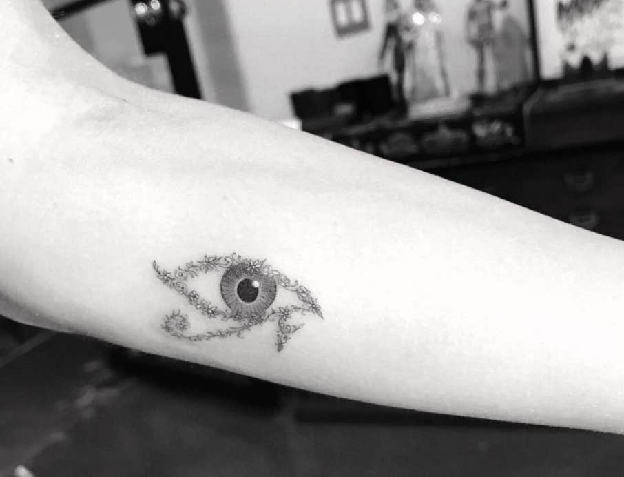 evil eye minimalist tattoo