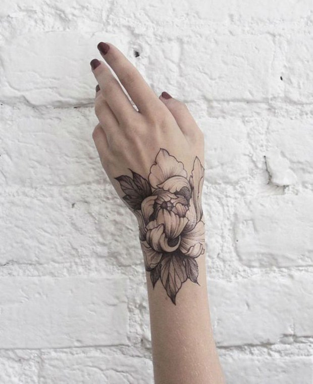 21. Flower petal design on wrist