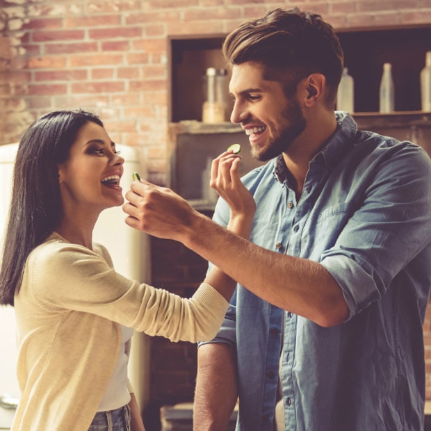 couple feeding each other