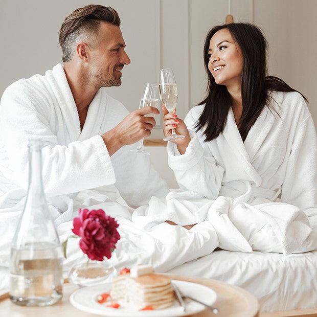 couple in hotel bathrobes