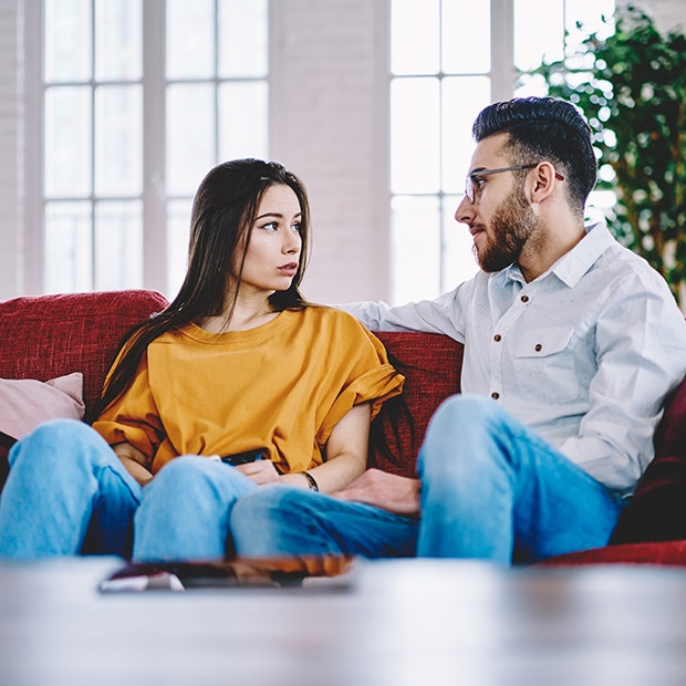 couple talking on the couch