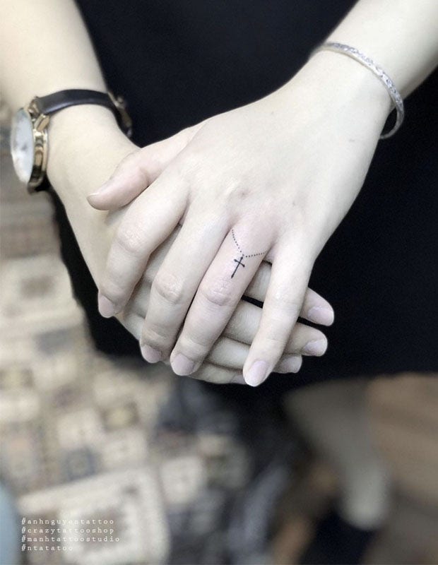 Christian wedding ring tattoo