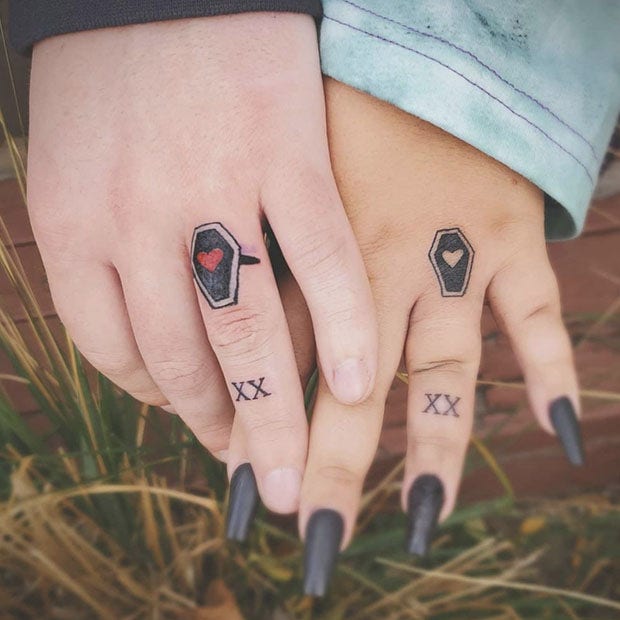 Coffin wedding ring tattoo