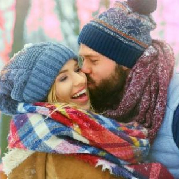 couple during cuffing season in winter snow