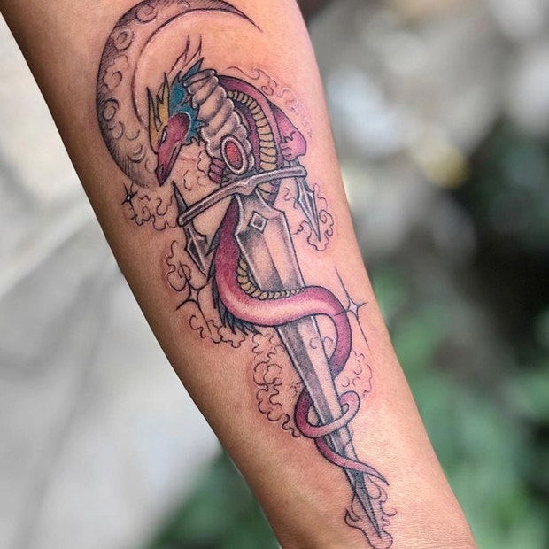 Dragon and sword tattoo