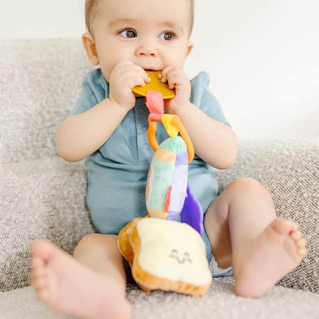 Melissa &amp;amp; Doug Multi-Sensory Take-Along Clip-On Infant Toy Baby Carrier