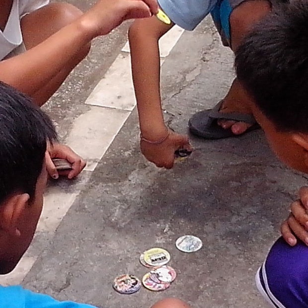 kids playing pogs