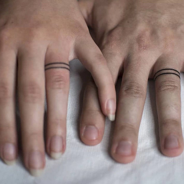simple band wedding ring tattoo