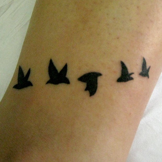 small tattoos with big meaning flock of birds