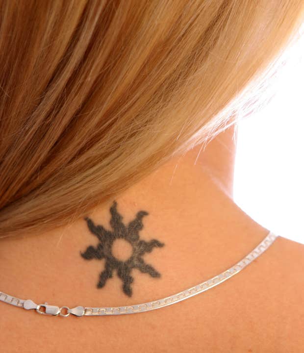 sun tattoo idea for women