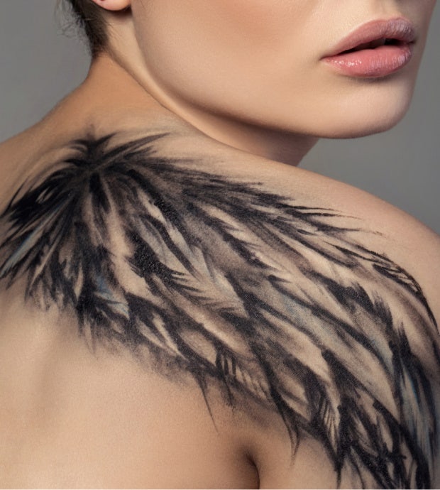 wings tattoo idea for women