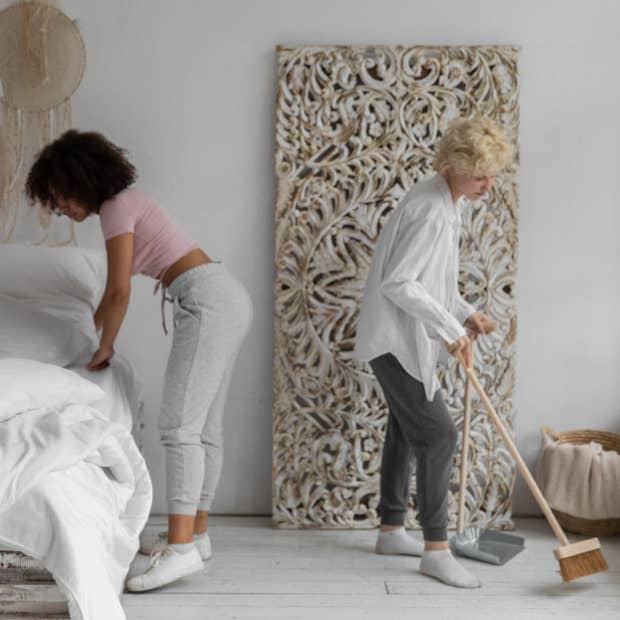 women cleaning a bedroom