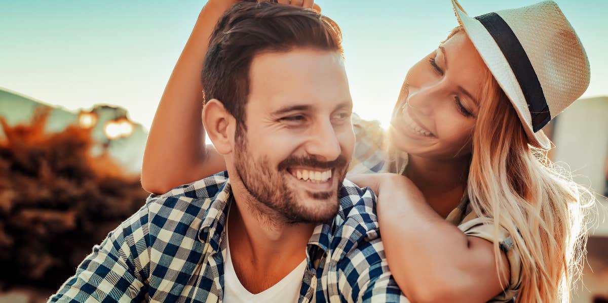 4 Tried-And-True Ways To Instantly Get Your Ex Back couple flirting with one another