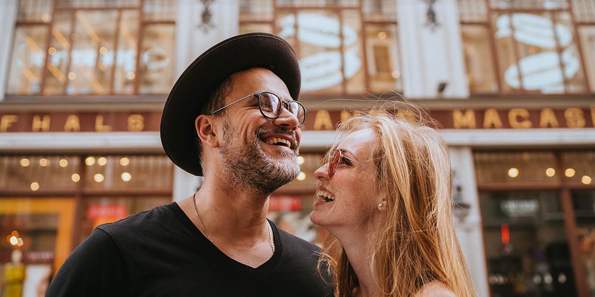 Astonished hipster couple traveling, having fun on summer vacations.