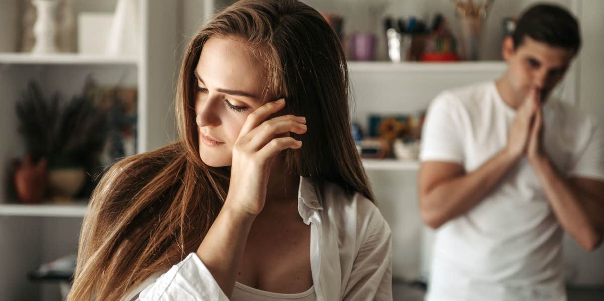 Upset couple ignoring each other