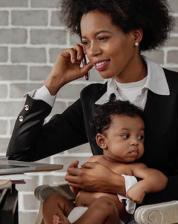 mother with baby at work