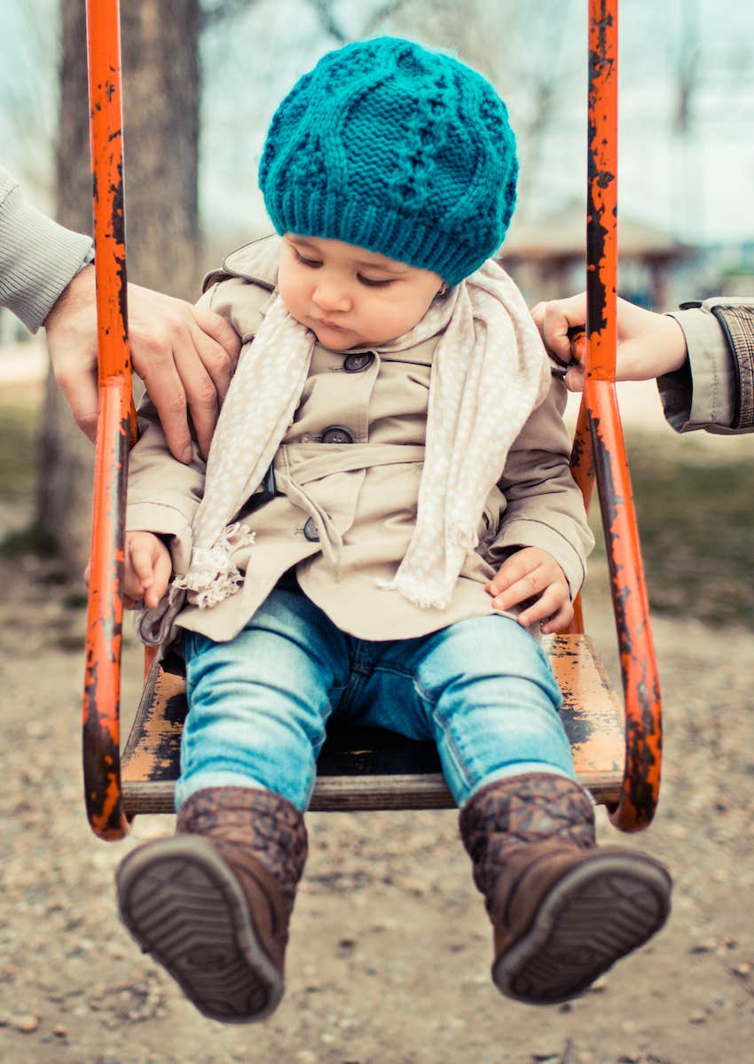 child on swing