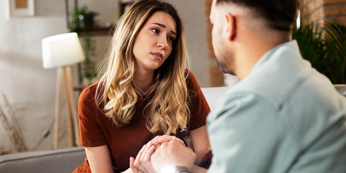 Young woman having a problem. Boyfriend comforting his sad girlfriend.