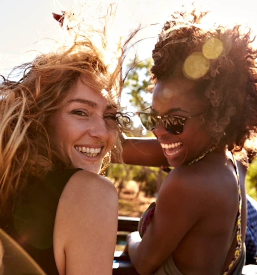 2 excited happy women on a road trip