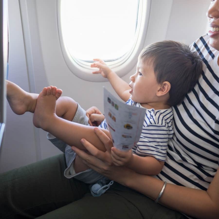 woman asks mother to calm her child down on flight