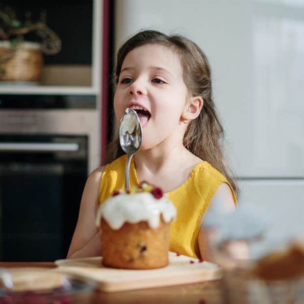 girl eating cake