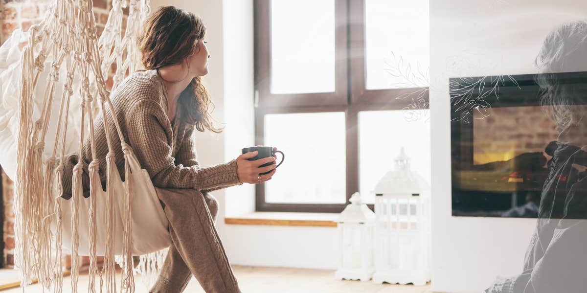 Woman sitting with coffee by fireplace, smell of late mothers perfume moving towards her 