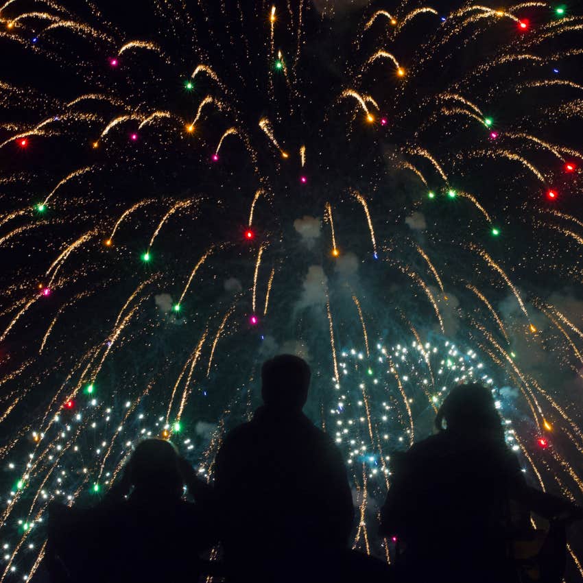 family watches fireworks