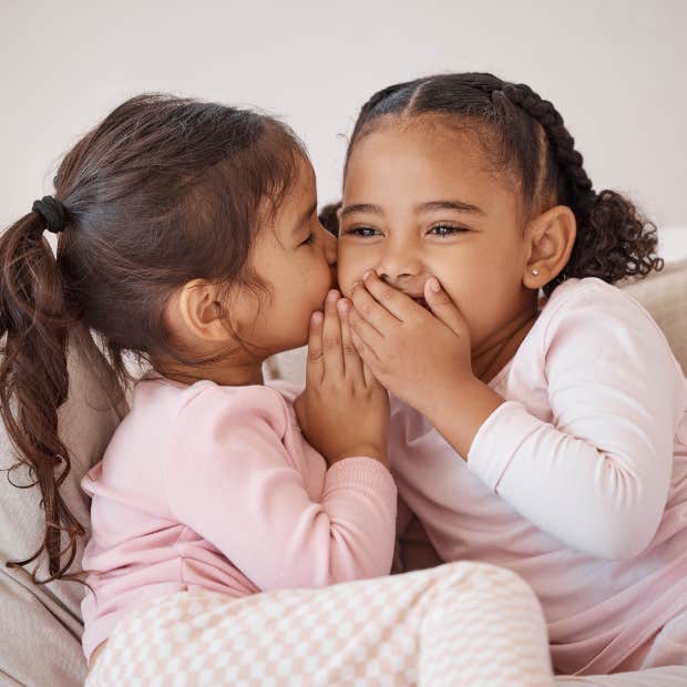 two girls talking and playing