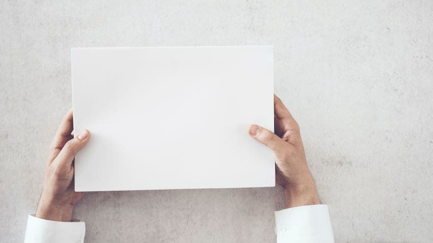 hands holding blank paper