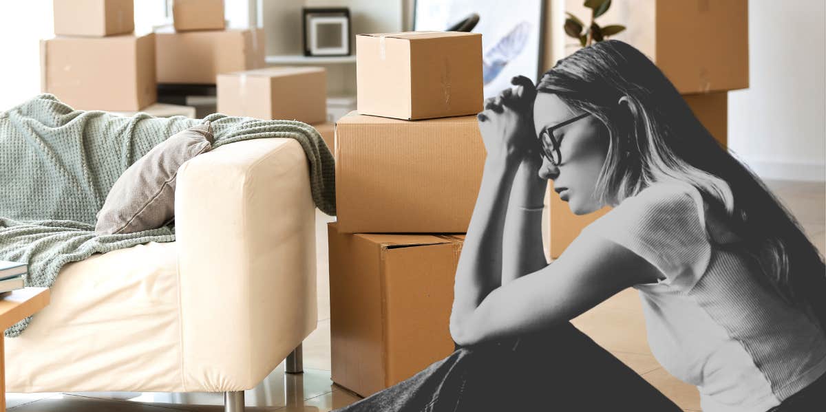 sad woman packing up apartment