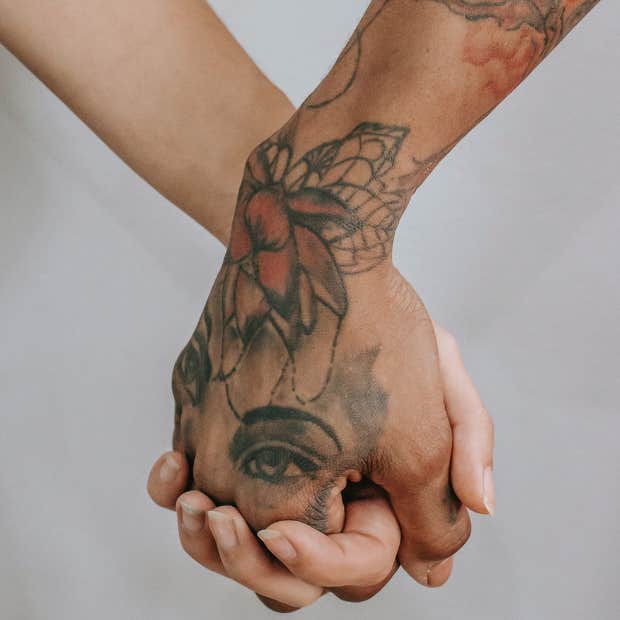 holding hands tattoo