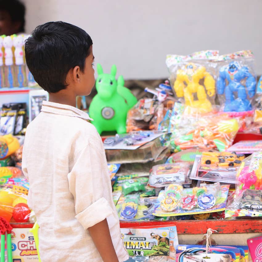 Little Boy Given The Opportunity To Pick His Own Christmas Gifts At Walmart Refuses To Get Anything For Himself