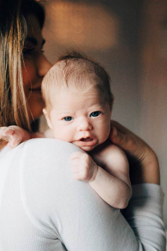 woman holding newborn