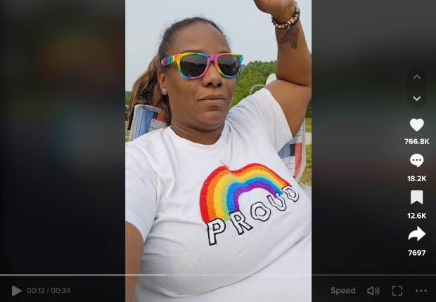 mom wearing pride shirt at soccer game