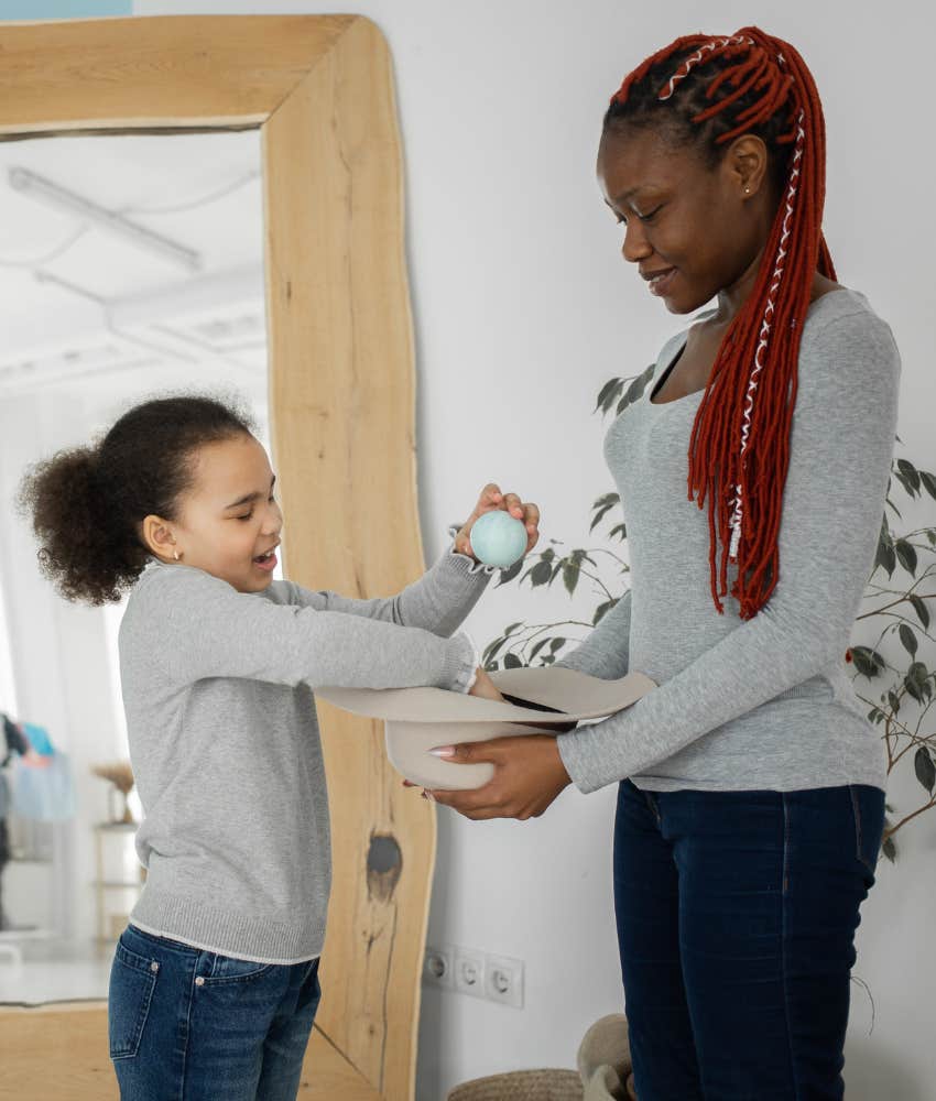 woman playing with child