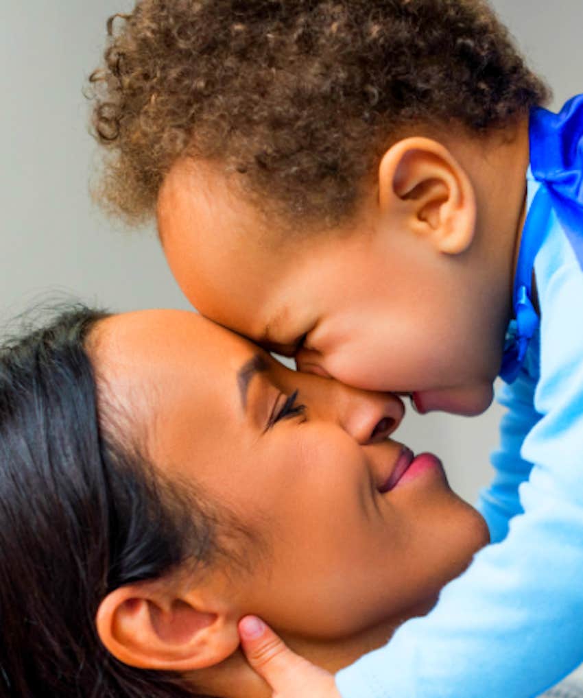 mother and baby face to face joyful