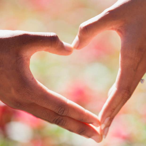 two hands making heart shape