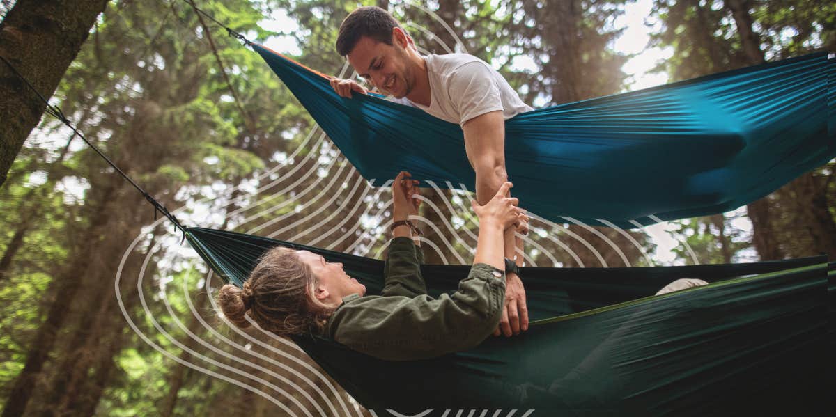 Couple hanging in hammock