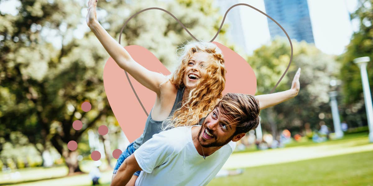 The Person That Says 'I Love You' First, According To Research happy couple being playful in the park on a sunny day