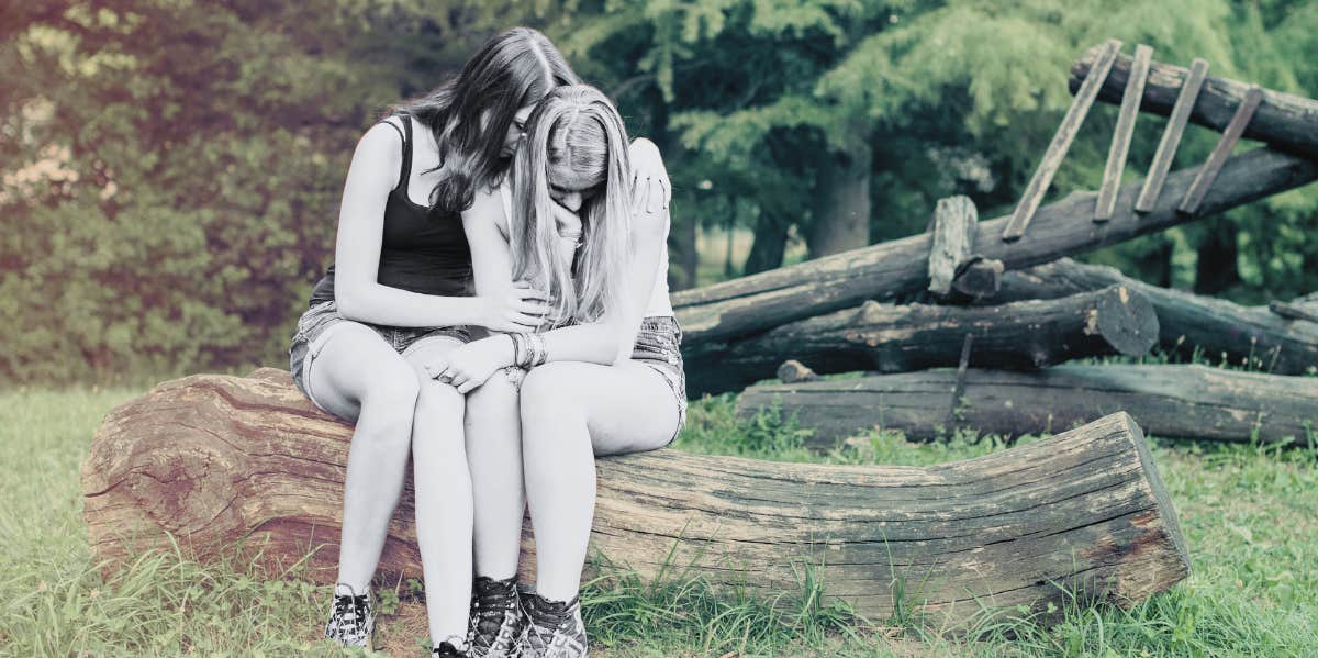 woman's friend comforting her empathetic heart