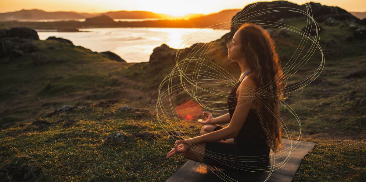 empathic woman taking a quiet moment for herself in nature