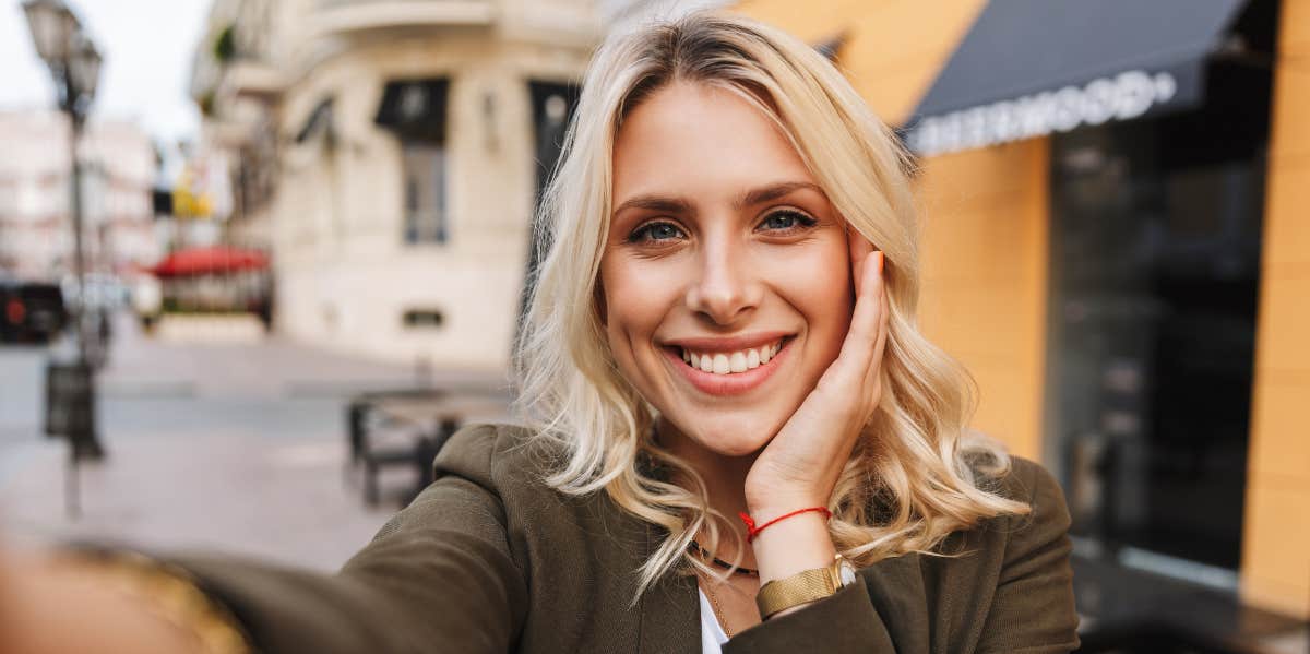 beautiful woman taking selfie