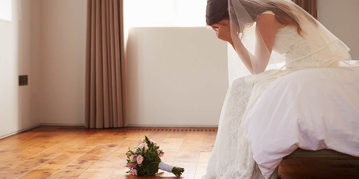 Bride In Bedroom Having Second Thoughts Before Wedding