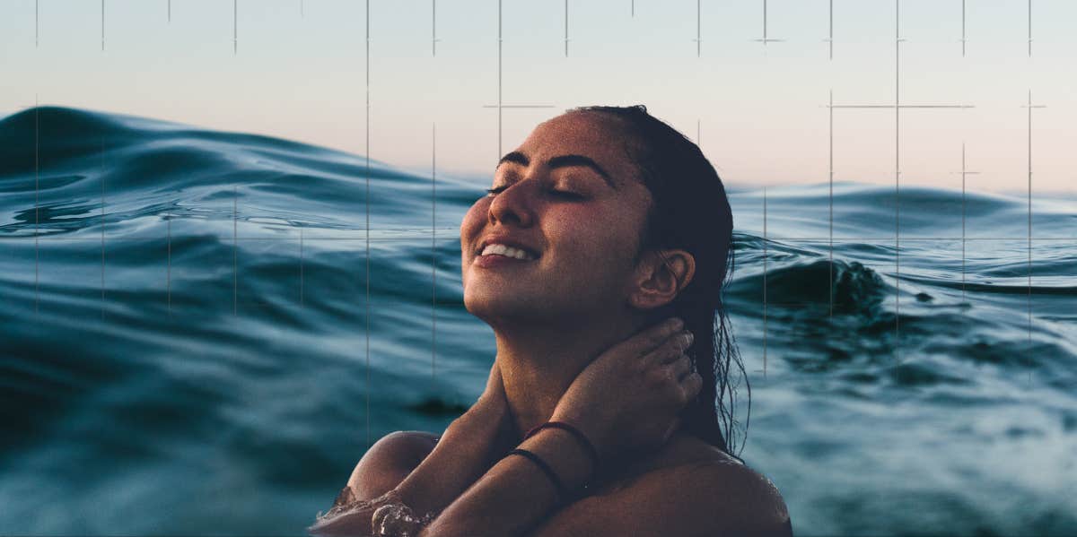 Why Blue Space Is Better Than Green Space woman breaking the waters surface