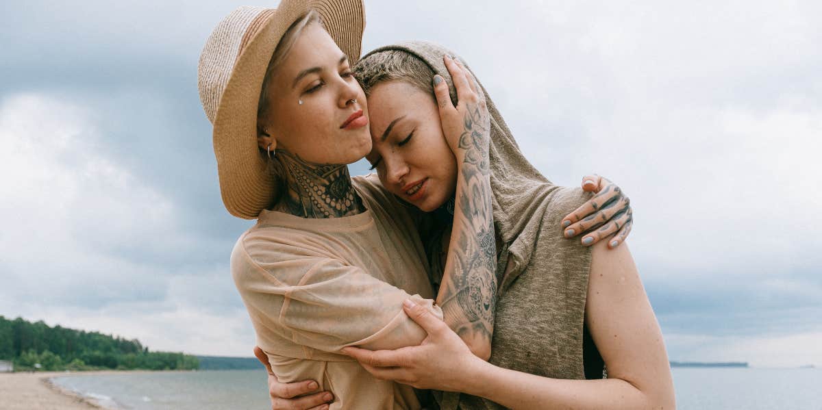 LGBTQ couple embracing