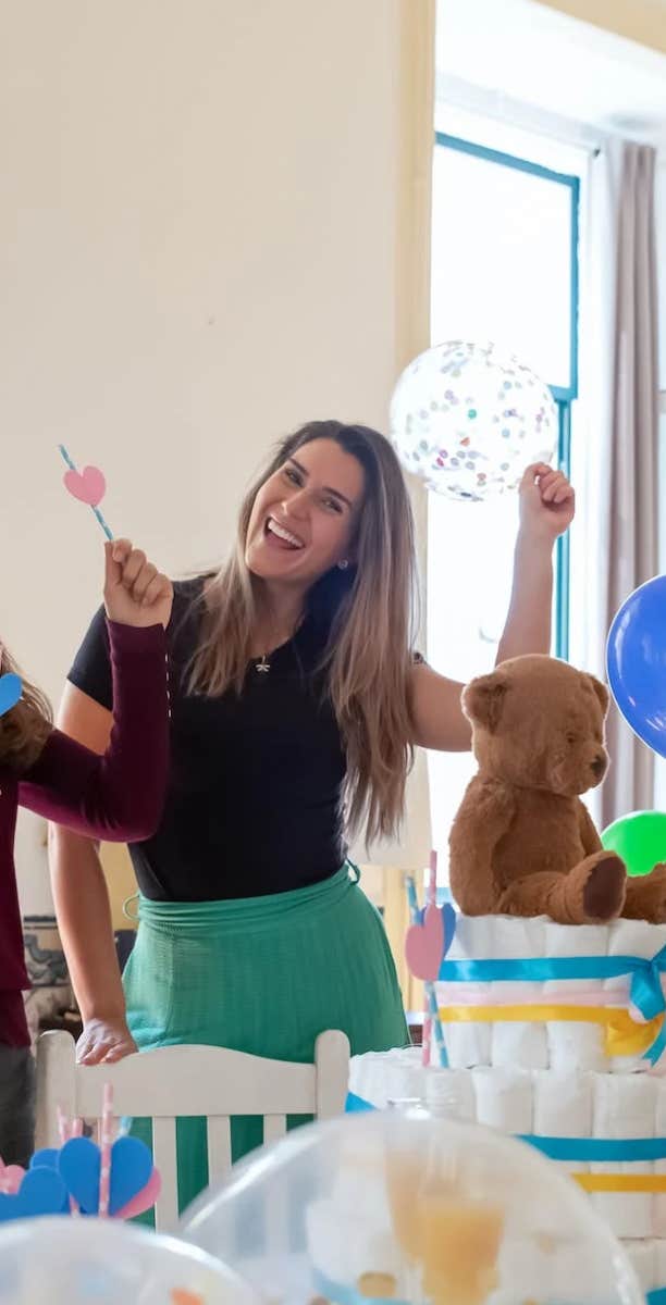 woman having fun at baby shower 